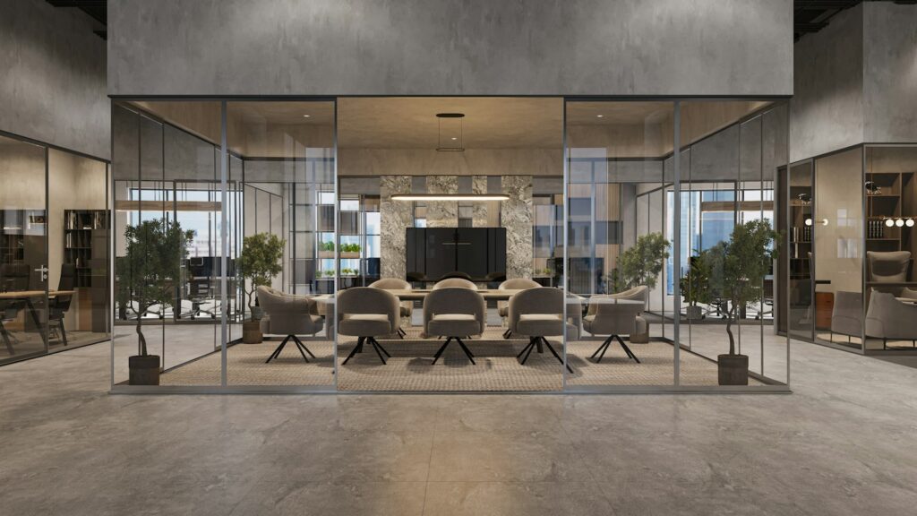 Glass-walled boardroom representing an ERP software evaluation meeting in a UAE office